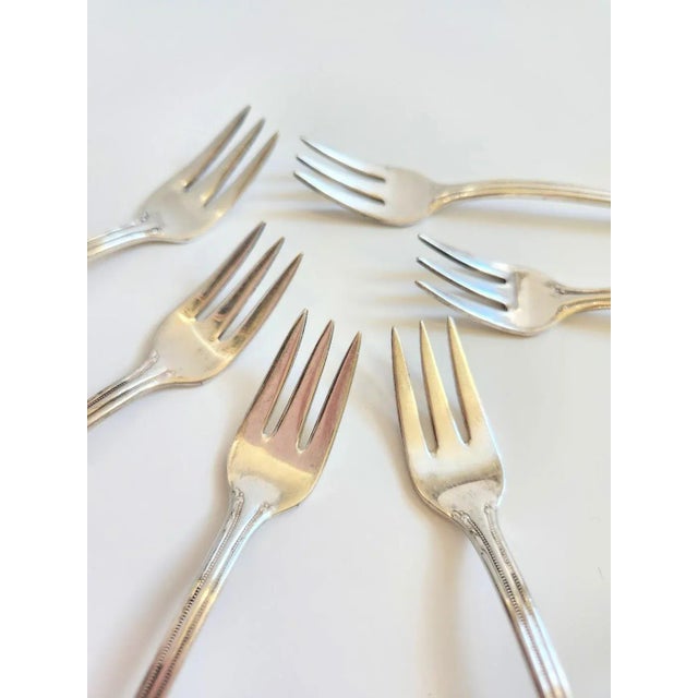 Silver Plate Remembrance Cocktail Fork Set Markers Mark 1847 Rogers Bros IS Excellent condition, weight and unique prong...
