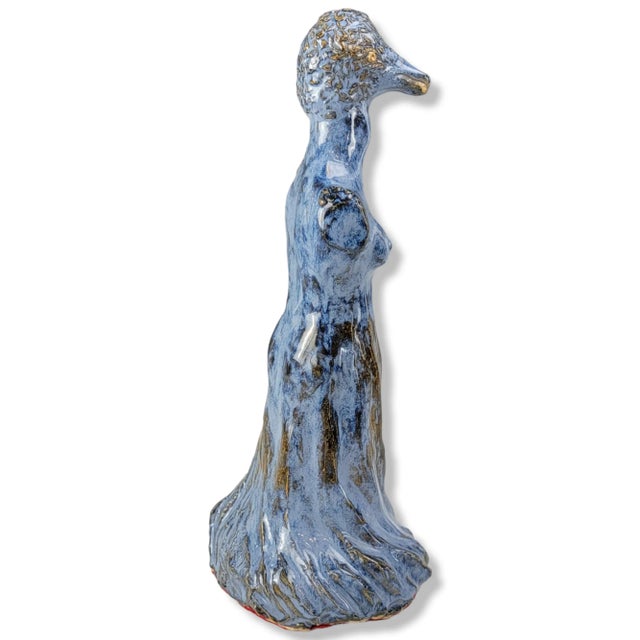 This is a gorgeous modern clay sculpture. The item features a sculpture of a woman's body with a bird head varied with...