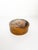 French round decorative box dating from the 1950s, crafted from wood with a warm honey-brown finish. The lid is adorned...