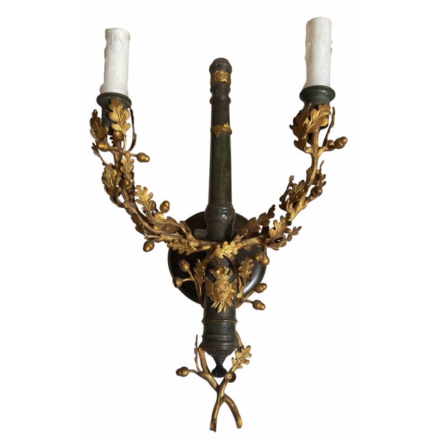 Pair of Louis XVI Style Gilt Bronze Two Light Wall Sconces.