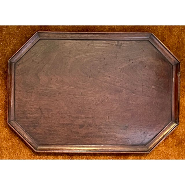 Antique early 19th century English George III mahogany octagonal tray with carved ogee rim. Measures 14 1/8" x 9 7/8" x...