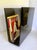 Here is a vintage, Postmodern/Modern later 20th-century magazine rack crafted from translucent smoked gray Lucite with a...