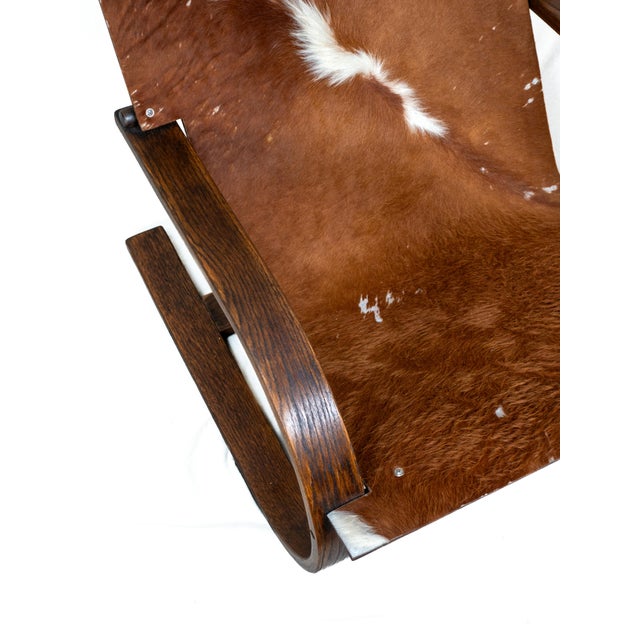 Studio-made cowhide-covered lounge chair. No maker's marks or tags are present, I believe it was probably made in the...
