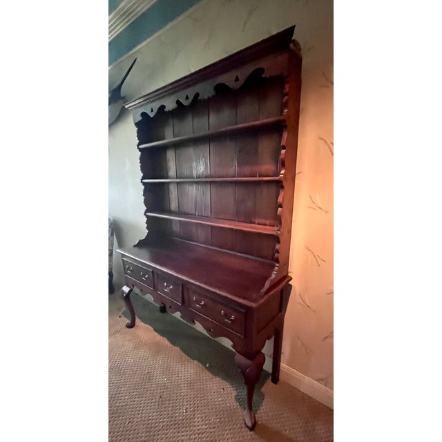 Queen Anne style welsh dresser with a scalloped frieze and cabriole legs. Oak wood with amazing patina lightly distressed...