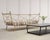 A refined "Element" coffee table designed by CAMERICH, featuring a rectangular slab top in richly figured polished grey...
