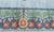 This Modern Arts and Crafts Style Rug presents a captivating fusion of tradition and contemporary charm. The field is a...