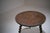 French solid oak tripod side table dating from the 1930s. Crafted from solid oak, this small side table stands on three...