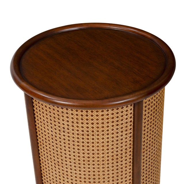 This round end table blends classic form with artisanal texture. Wrapped in open-weave natural cane framed by rich wood...