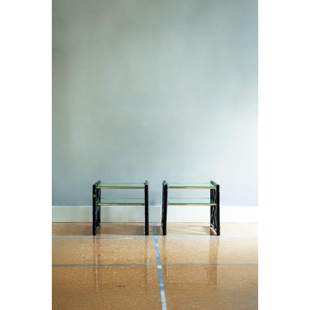 Black Lacquered Bamboo Bedside Tables – 1970s Product details with glass shelves, lacquered rattan bindings, and brass...