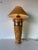 A striking 1980s vintage table lamp that exemplifies organic modern design, featuring a tall amphora-inspired base wrapped...