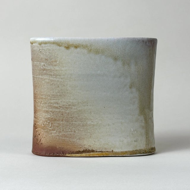 Vintage Anagama Fired Ash Glaze/Crackle Glaze Stoneware Vase, Signed. Thin oval shaped stoneware vase wiring an ombré...