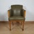 A superb art deco armchair by maurice adams. Burr walnut and figured walnut veneered with solid walnut carved detail to...