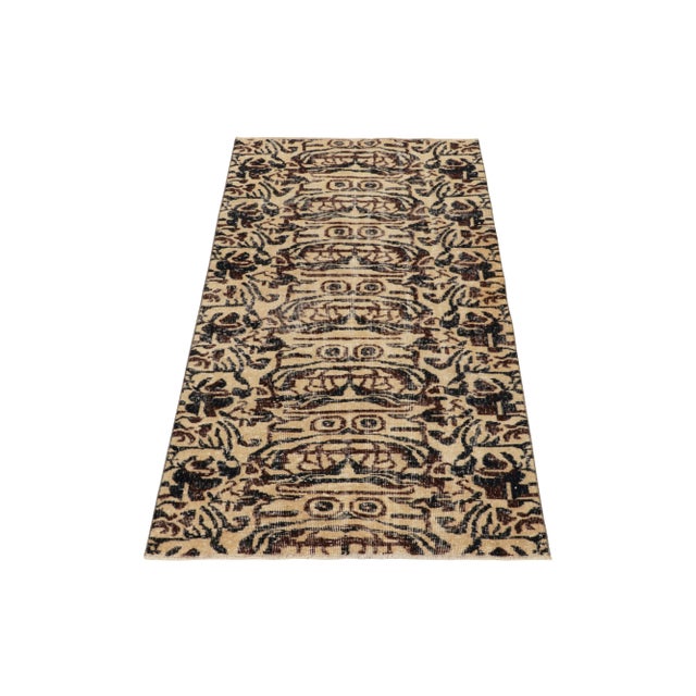 Hand-knotted in wool from Turkey circa 1960-1970, a vintage 3x6 distressed runner from an acclaimed Turkish artist joining...