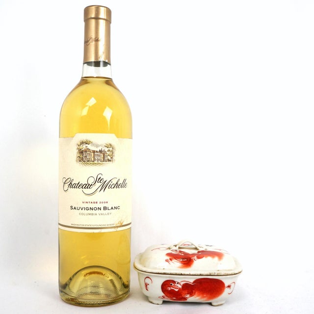 A late 19th C or early 20th C oval-shaped Chinese lidded soap box featuring a distinctive hand-painted iron-red Buddhist...