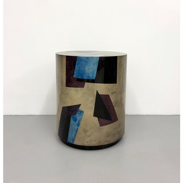 A striking vintage Postmodern side table handcrafted in Colombia by JIMECO Ltda., featuring a clean cylindrical silhouette...