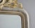 Found in France, this large Louis Philippe mirror dates from the 1870s. Silver gilt frame has subtle etched design of...
