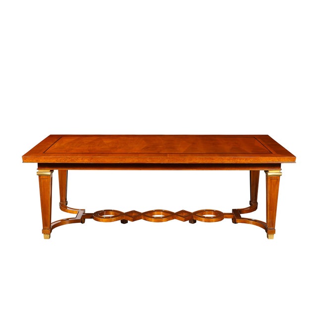 This breathtaking Art Deco Directoire Style Dining Table in Book-Matched Walnut W/Bronze Mounts & Ebony Inlay from L' Art...
