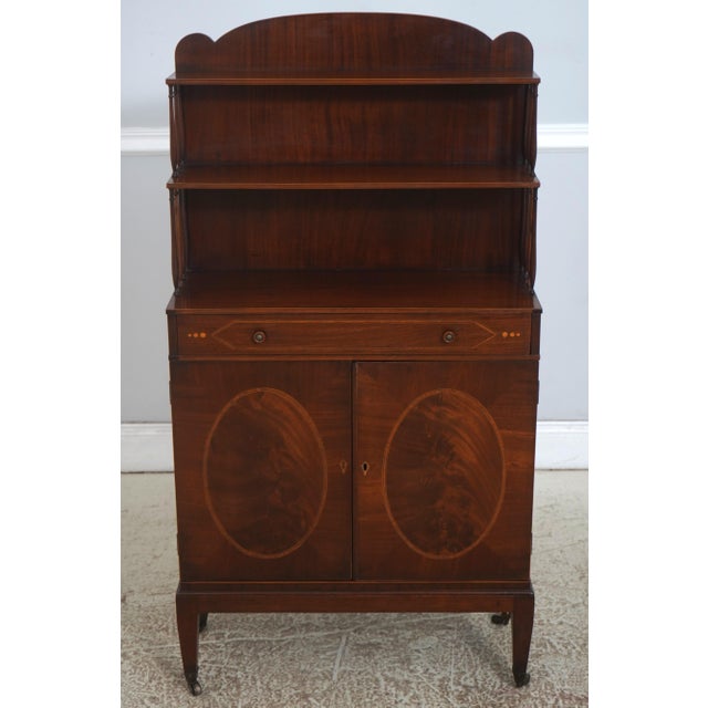 Age: c1940s Details: Hand Dovetail Drawer Construction Mahogany Key Locking w. Key Adjustable Shelves Brass Capped Feet w....