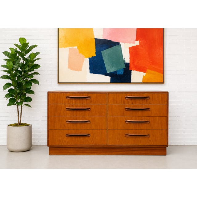 Vintage Mid century Modern Teak Double Dresser from G-Plan's iconic Fresco line, c. 1960's. This gorgeous piece packs a...