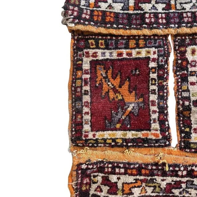 Handwoven saddlebag from southwestern Persia. Made by the nomadic Qashqai people for carrying personal items on horseback....