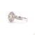 This estate ring, an early-twentieth-century antique design, centers on a 1.07-carat diamond in an old European cut, an...