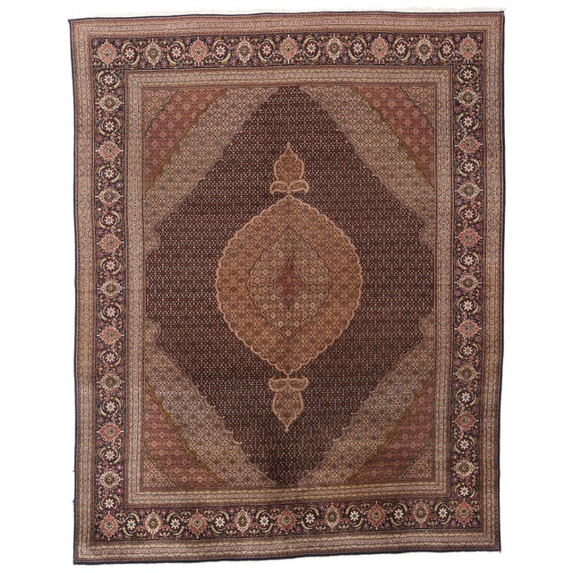 61005 Vintage Persian Mahi Tabriz Rug, 09'11 x 12'08. With ornate details and well-balanced symmetry, this hand-knotted...