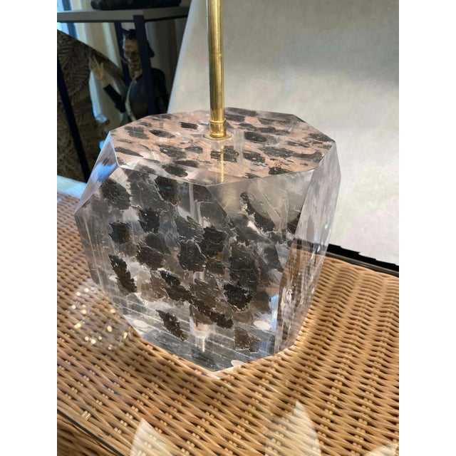 In hues of charcoal gray layered within these thick Lucite sheets, these table lamps are very heavy and quality crafted....