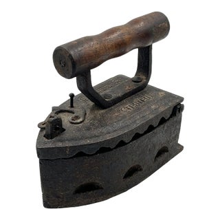 Antique Cast Iron Coal-Fired Sad Iron With Wooden Handle For Sale