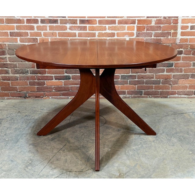 Fabulous mid century modern styled dining table by Copeland Furniture of Bradford, Vermont in solid cherry wood! Has an...