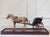 A charming horse and carriage model dating from the first part of the 20th century, composed of a carved wooden horse and...