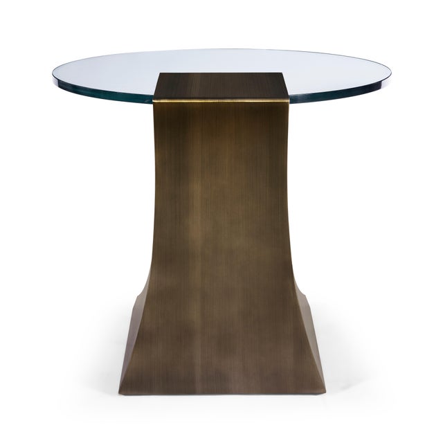Modern Bronze Lamp Table designed by Greg Sheres. Round Glass top. In stock now. The "Hepburn" side table is a throwback...