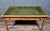 Napoleon iii period center desk in light wood opening in the frieze with two drawers, green leather writing surface turned...