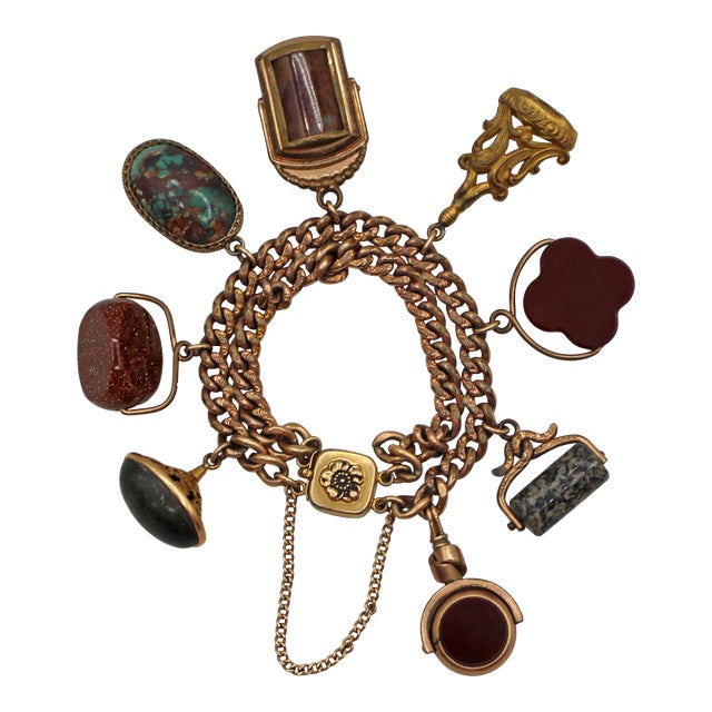 Circa 1920s Gold Watch Fob Charm Bracelet For Sale