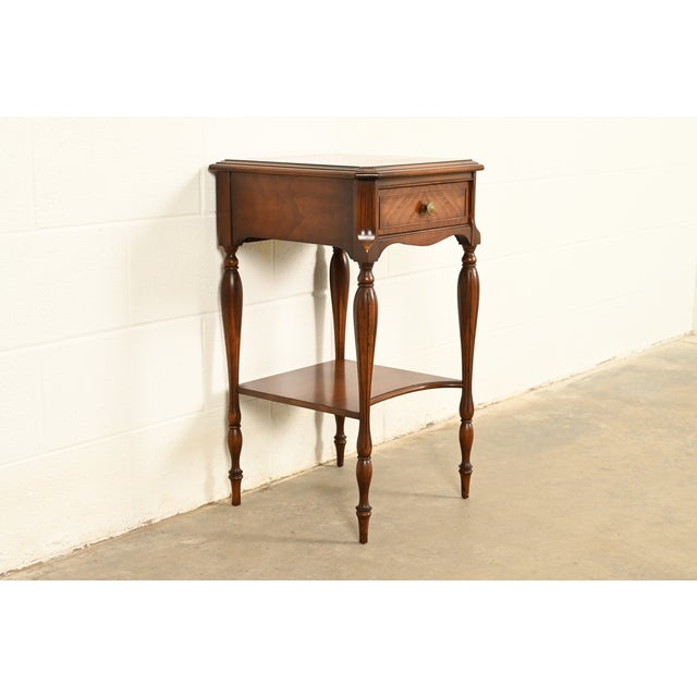 A gorgeous antique French Regency Louis XVI style nightstand, tea table, or occasional side table By Widdicomb USA, Circa...