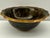 A Japanese cloisonné enamel bowl from the Showa period, distinguished by its intricate hand-laid wirework and richly...