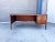 Embodying the clean architectural principles of modernist office design, this vintage executive desk is styled in the...