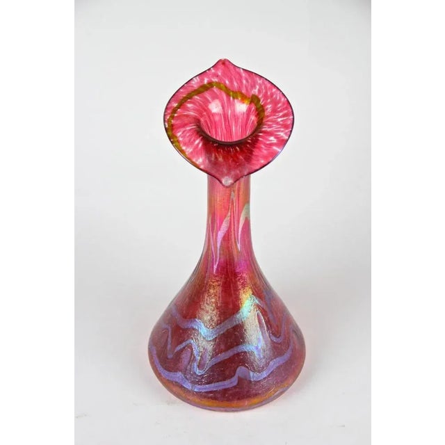 Rare example of a large red "Jack in the Pulpit" glass vase from Fritz Heckert around 1901. This unique piece of Art...