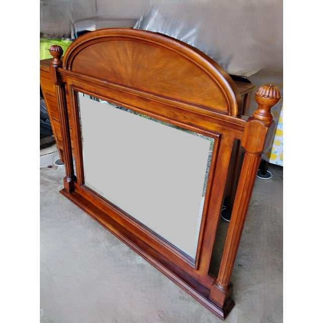 Solid wood, very well built. Nice bevel edge glass with no scratches or nicks on glass. I do not know the manufacturer....