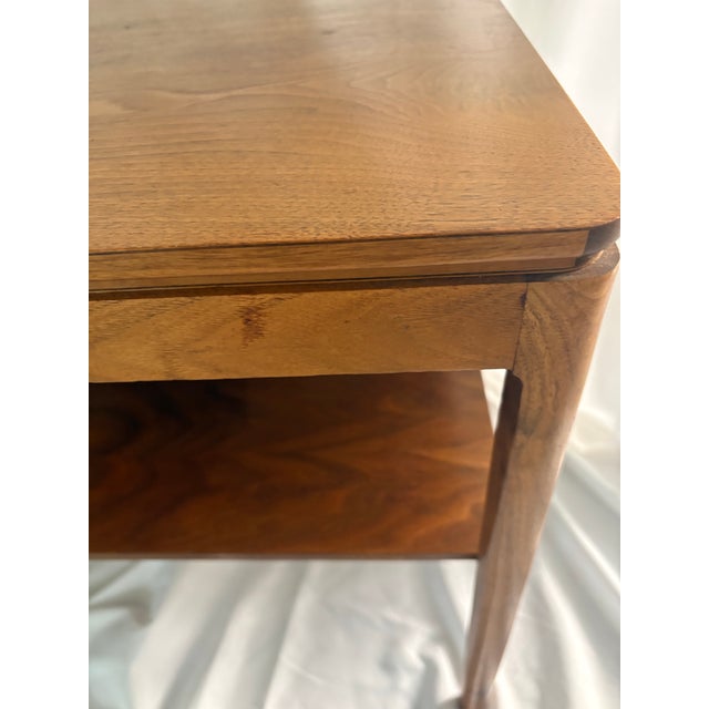 This Drexel side table was designed by Kip Stewart and exemplifies MCM design.As part of Drexel Declaration line, the...