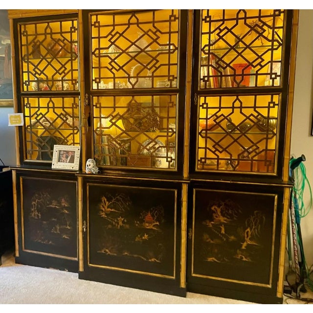 Chinese Sideboard/Breakfront Cabinet, Late 19th Century. 86 inch high by 87 inch wide. The top with 3 glazed doors with...