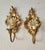 An exceptional pair of elegant antique rocaille wall lamps, gilded wood with a beautiful original patina, hand-carved,...
