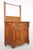 Antique Victorian style washstand made of quarter sawn oak with casters. It features a tall back rail designed to hold a...