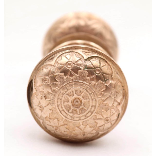 Antique Vernacular style polished brass passage door knob set made by Hopkins & Dickinson in the 1879 catalog. Part of the...