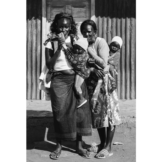 Contemporary Photography “Sisters - Family Portrait” by Douglas Condzo Two sisters and their children posing for a family...