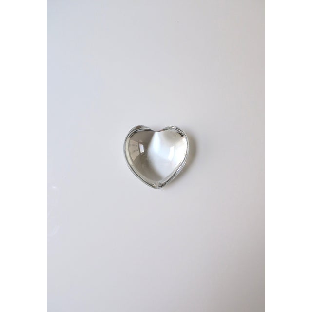 A French puffed crystal heart paperweight decorative object from luxury Maison Baccarat, circa late-20th century to...