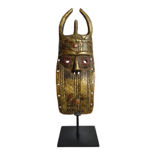 Early 20th Century Brass Toma Passport Mask on Stand For Sale