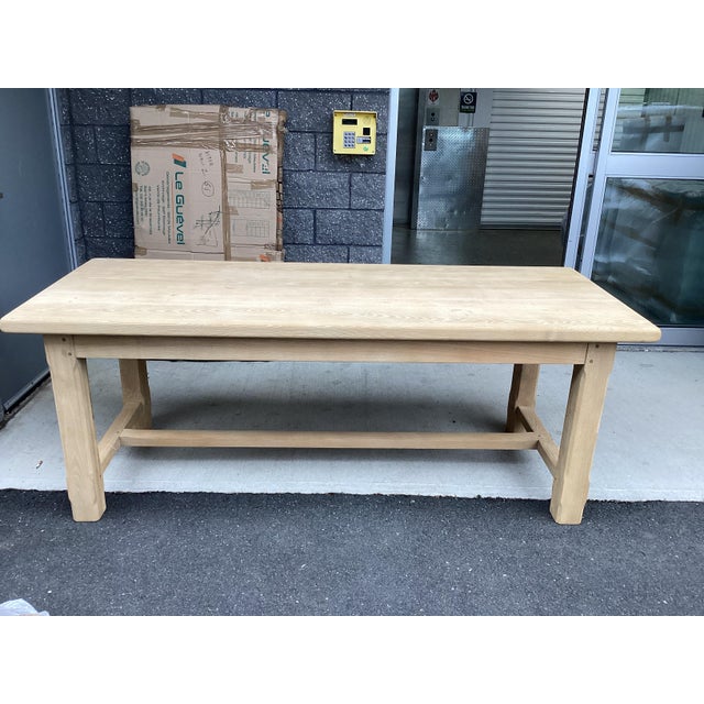 This is an authentic French farmhouse table which has been stripped of all colored finishes. Made of oak, this table now...