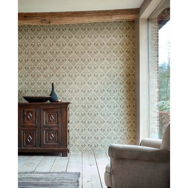 Redrawn and refined from the original Indian Diaper block print wallpaper of 1875 this wallpaper design features a trellis...