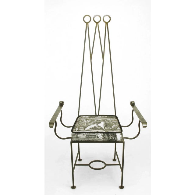 Set of eight custom designed blackened wrought iron dining chairs. Set consists of "king" and "queen" chairs and six...