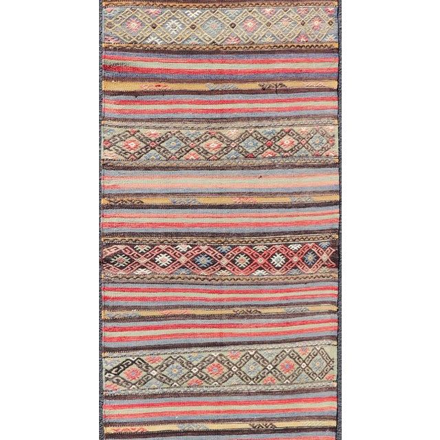 Red Vintage Turkish Kilim With Horizontal Stripes and Tribal Motifs in Bright Tones For Sale - Image 8 of 11